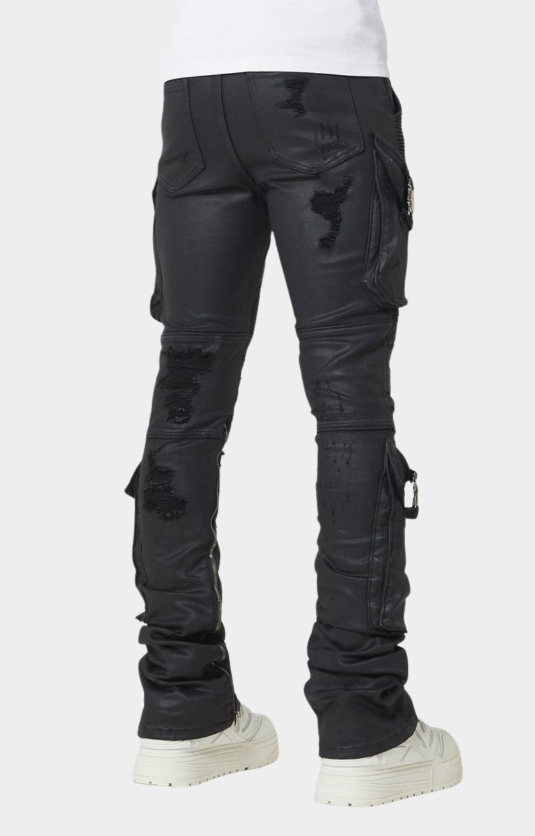 Tonal black distressed detailing on waxed denim.