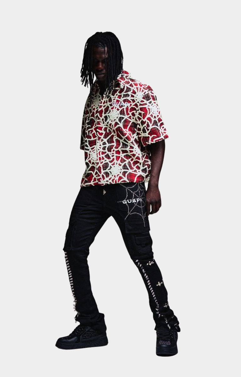 Slim fit flared guapi cargo denim jeans in Obsidian Black.