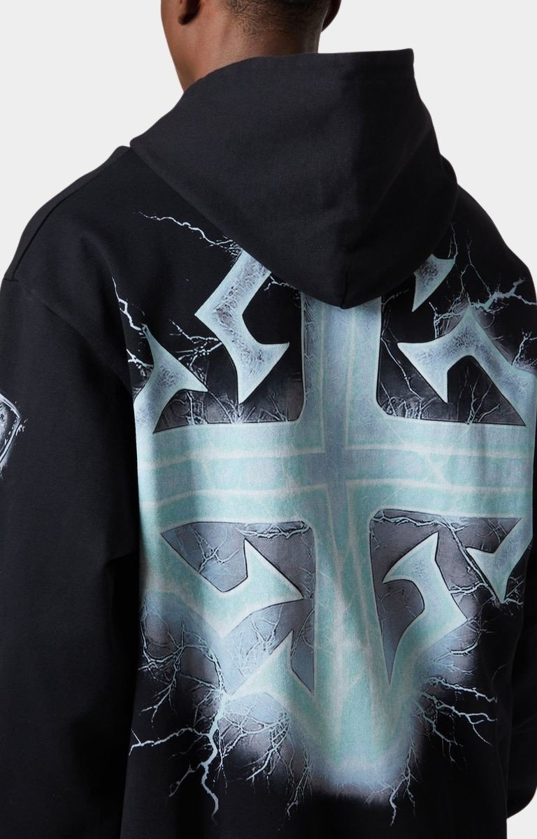 Close-up of high-voltage skeleton graphic on Guapi hoodie