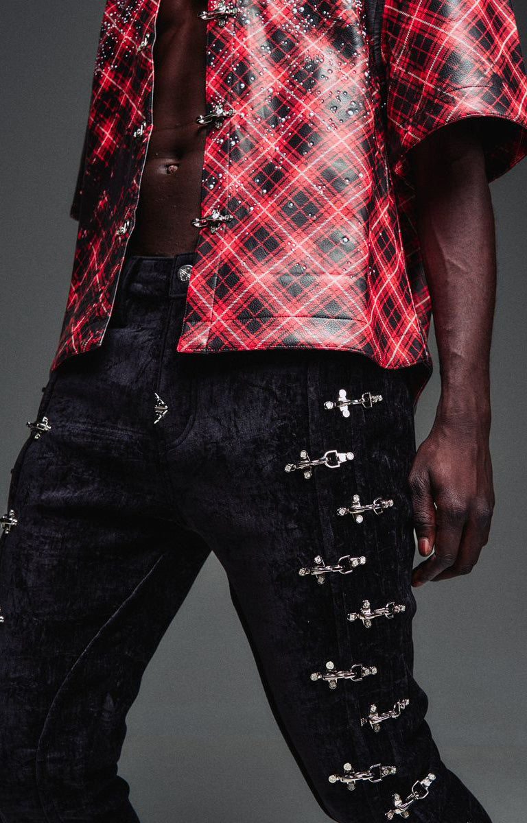 Guapi Black Velvet Aviation Clasp Pants featuring premium velvet, silver-tone aviation clasp hardware, tailored thigh construction, subtle flare, and GUAPI detailing.