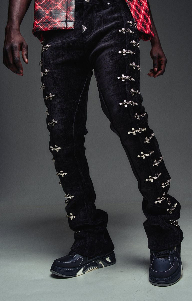 Guapi Black Velvet Aviation Clasp Pants featuring premium velvet, silver-tone aviation clasp hardware, tailored thigh construction, subtle flare, and GUAPI detailing.