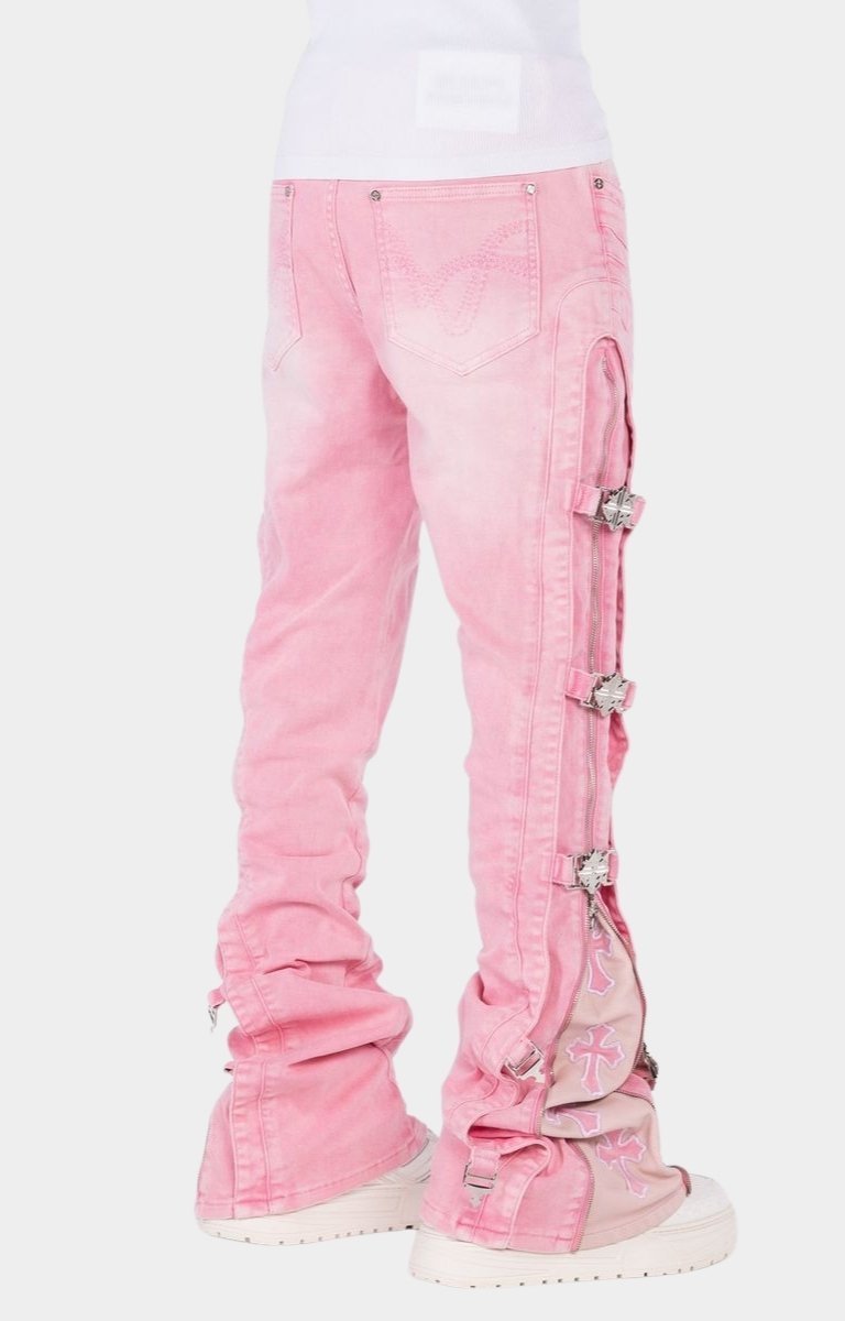 Designer denim jeans with custom buckle hardware and zipper construction.