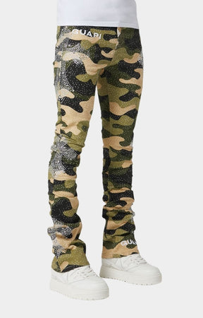 Crystal-studded cross embellishment detail on camo jeans
