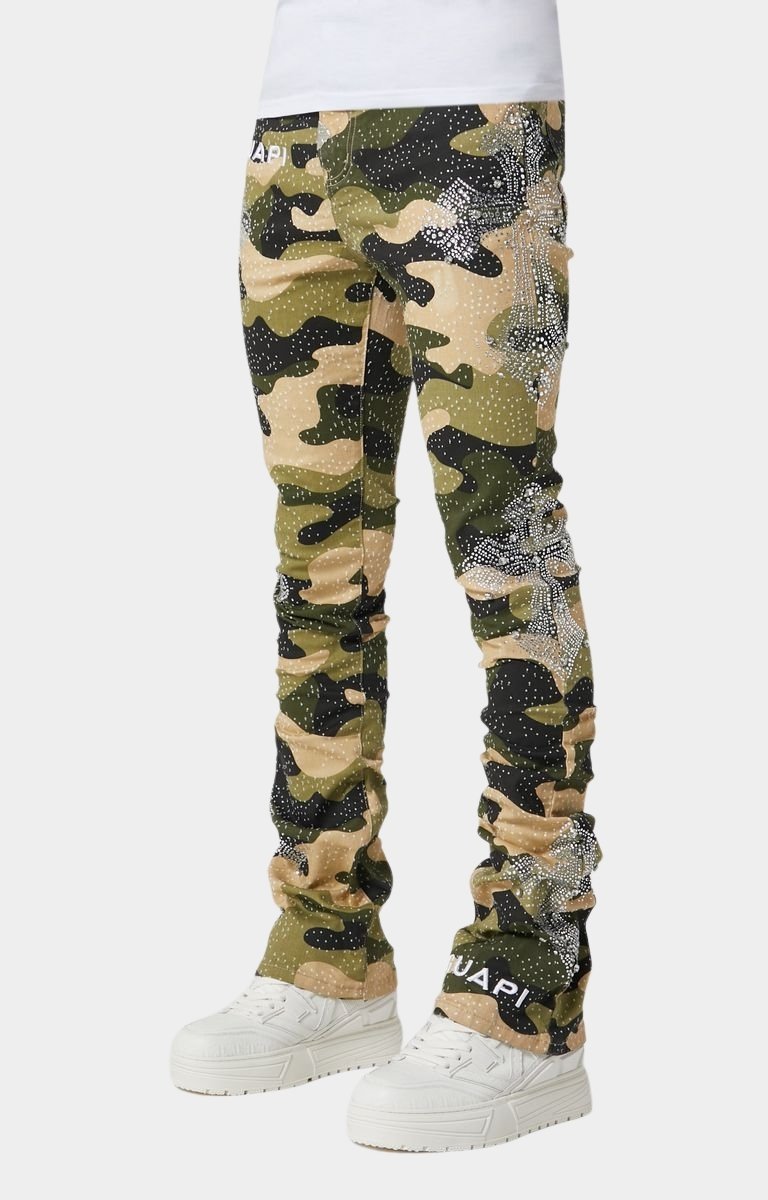 Stacked skinny fit Guapi Camo Cross Denim styled with sneakers