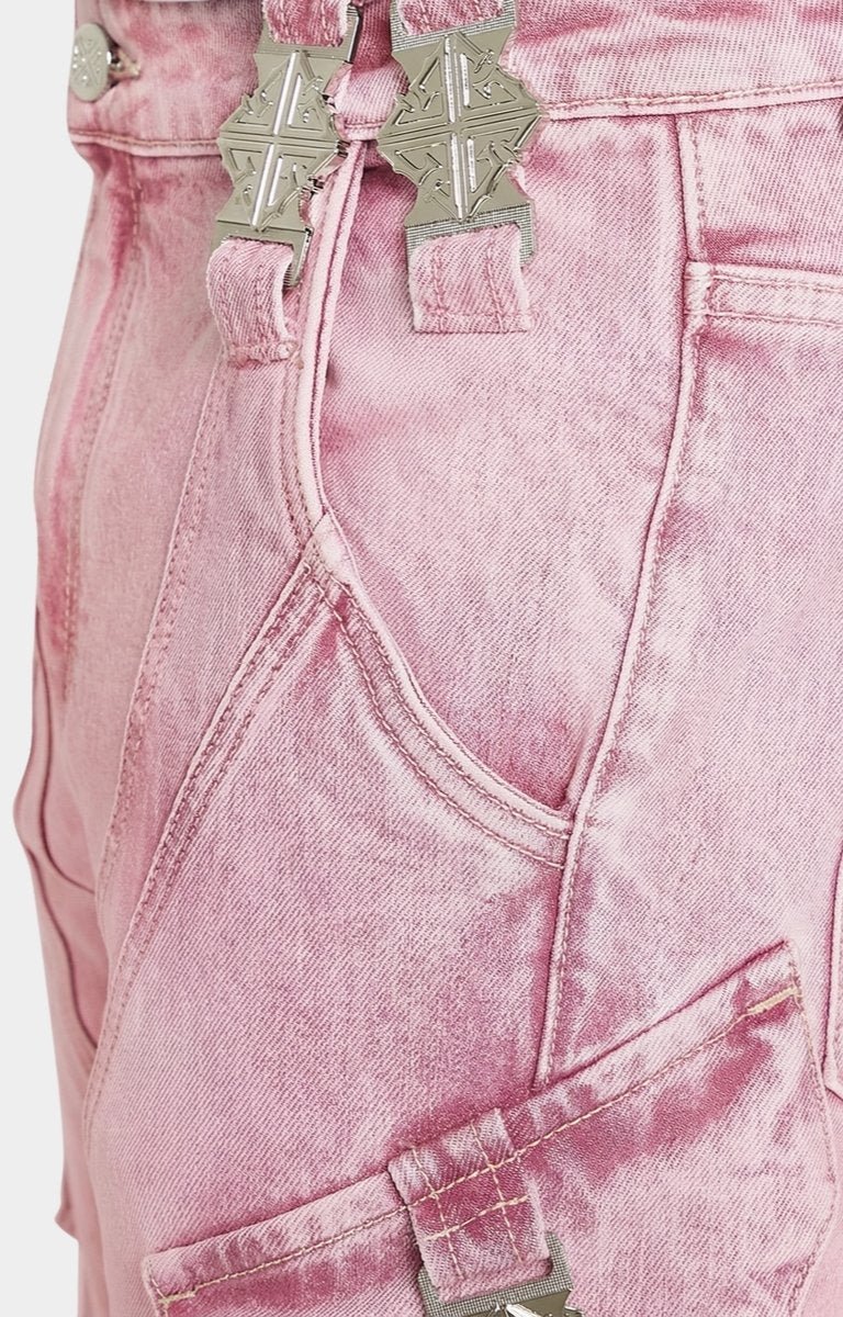 Cargo pocket with chrome buckle on GUAPI denim.