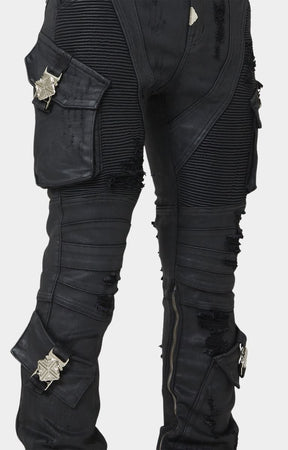 Cargo pocket with metal buckle on GUAPI denim.
