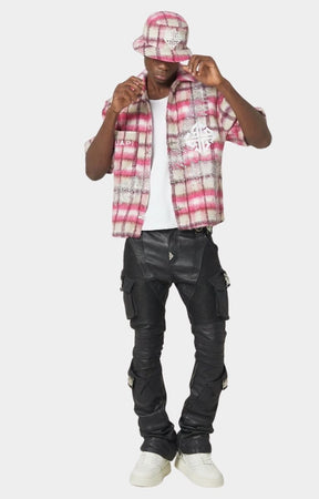 Cargo pocket with metal buckle on GUAPI leather pants.