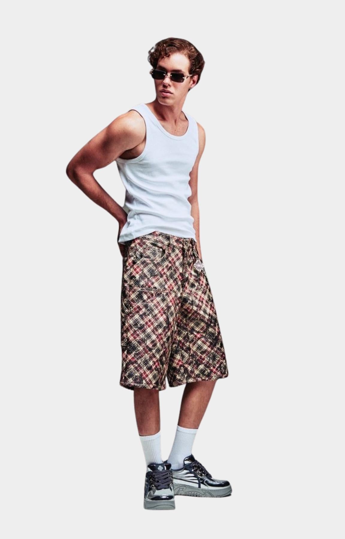 Signature hardware detail on Guapi Charcoal Plaid Leather Cargo Shorts.