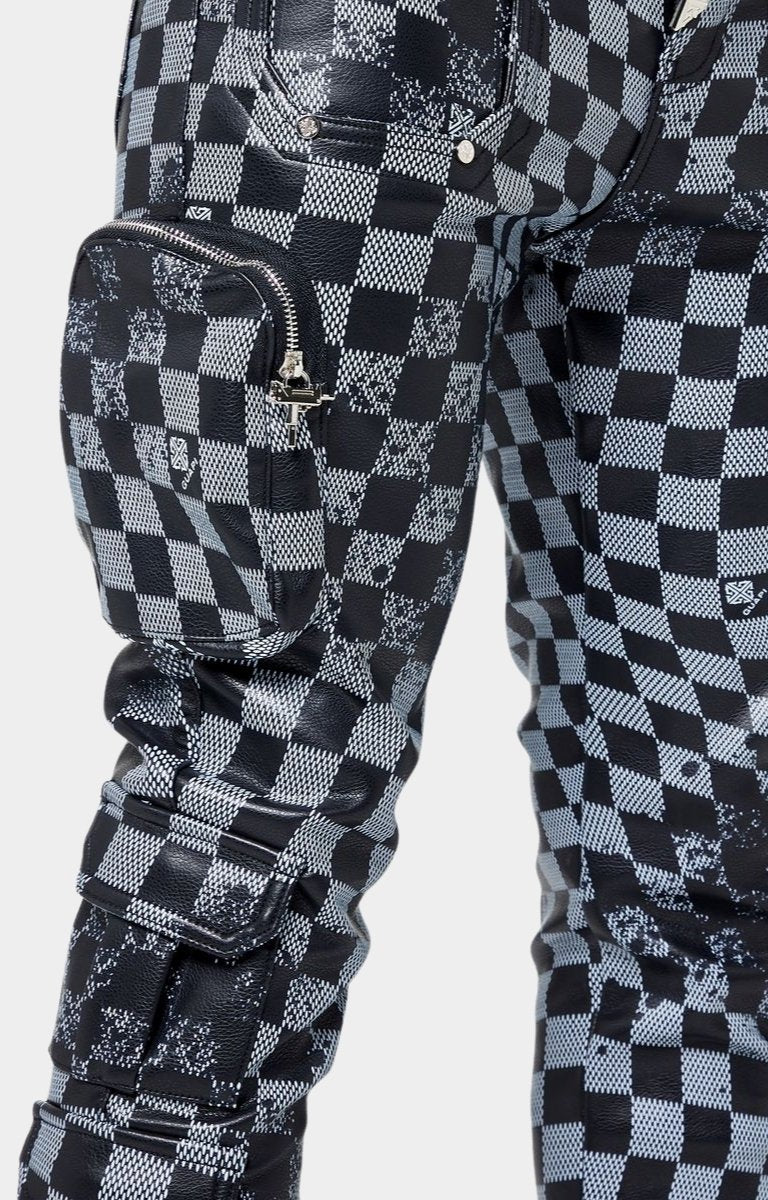 Chrome zipper and snap button hardware on Guapi leather pants