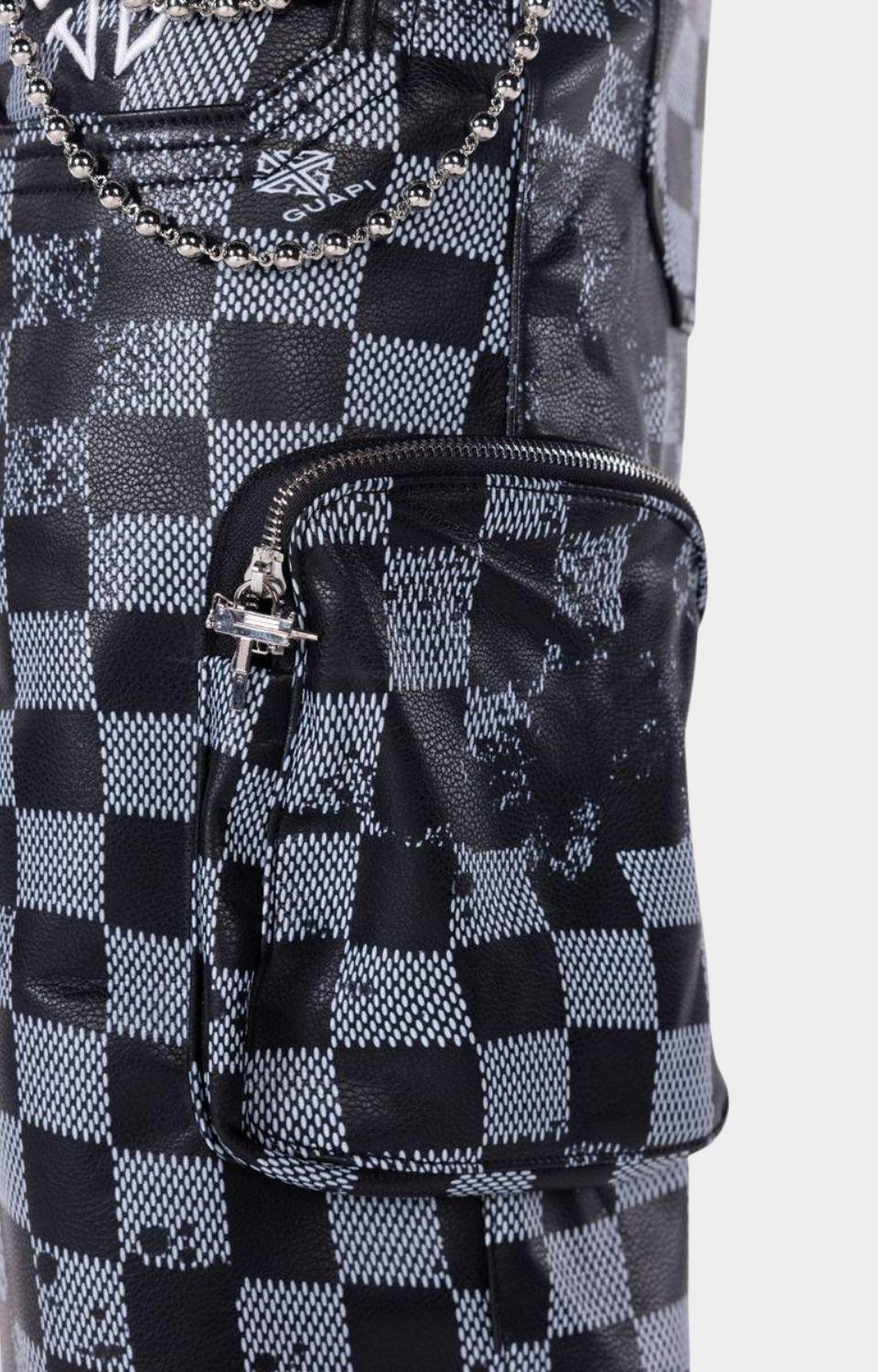 Cargo pocket detail on Guapi Checkerboard Leather Cargo Shorts.