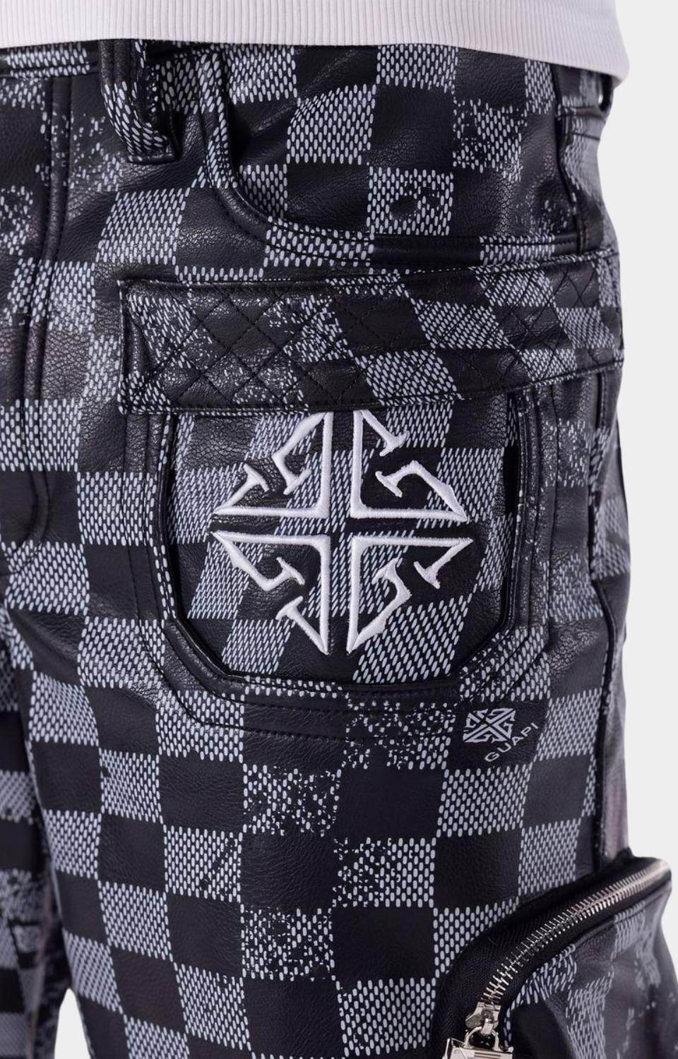 Zipper pocket detail on Guapi Obsidian Black Shorts.