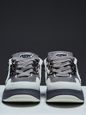 Guapi Cloud Grey Skate Star Sneakers featuring grey and charcoal panels, studded detailing, oversized laces, GUAPI metal hardware, graphic tongue patch, and sculpted sole..