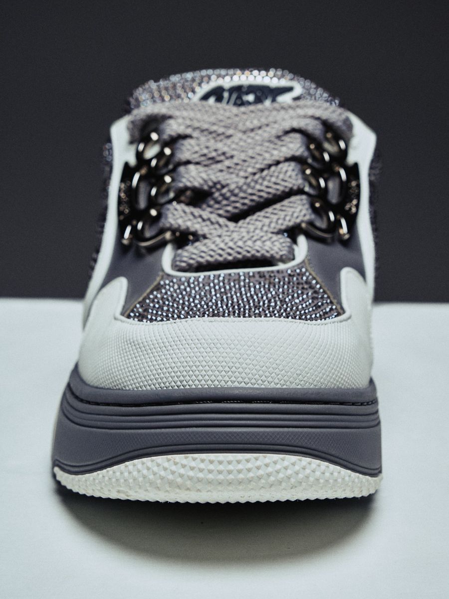 Guapi Cloud Grey Skate Star Sneakers featuring grey and charcoal panels, studded detailing, oversized laces, GUAPI metal hardware, graphic tongue patch, and sculpted sole..