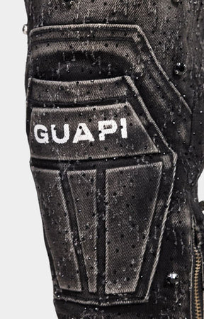 Coffin shaped knee panel detail on guapi black coffin arc embellished denim. 