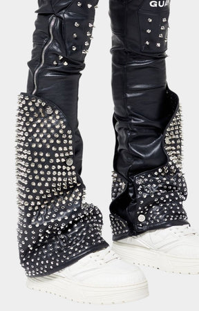 Detachable studded flare panels on Guapi Coffin Arc leather pants.