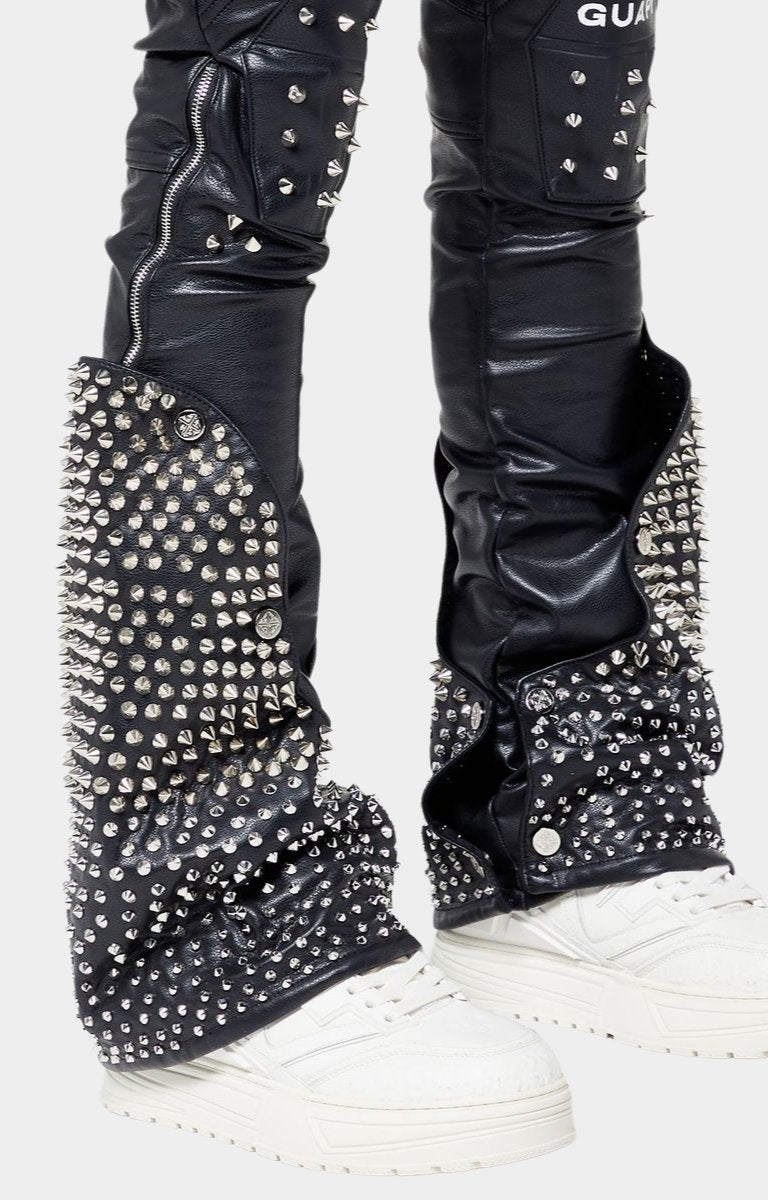 Detachable studded flare panels on Guapi Coffin Arc leather pants.