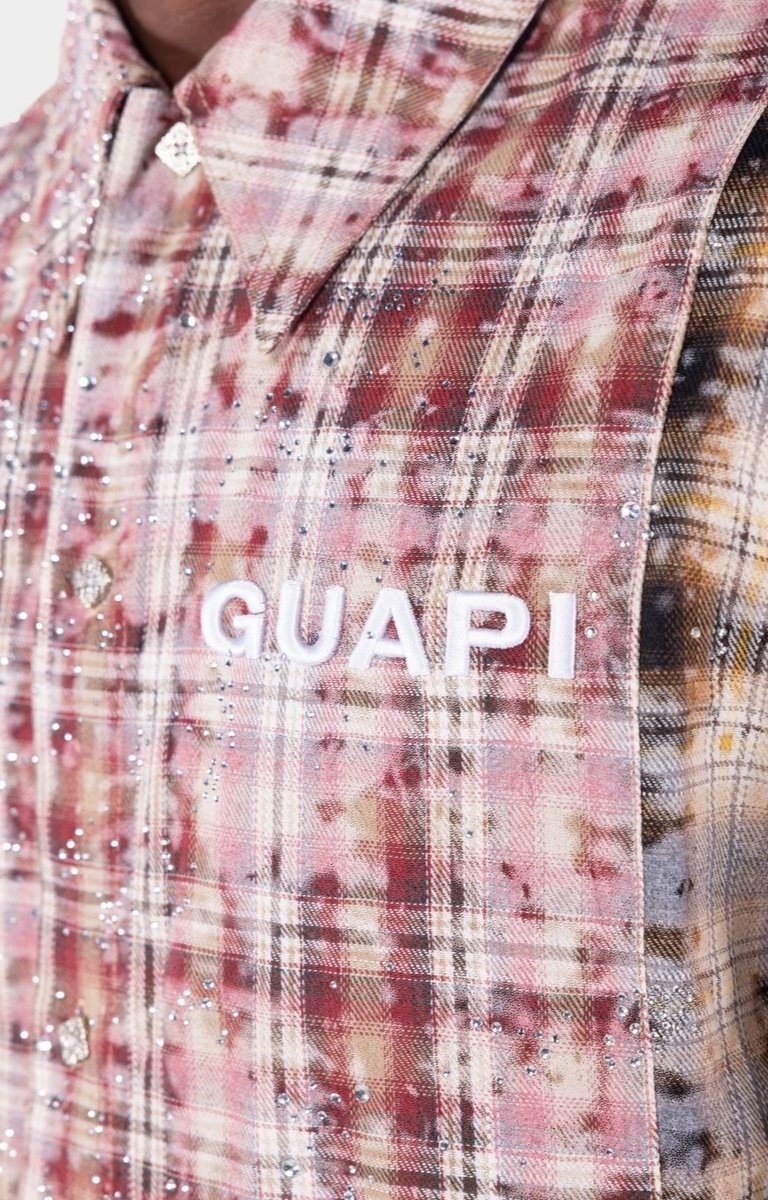 Plaid shirt featuring contrast panel construction and embroidered branding.