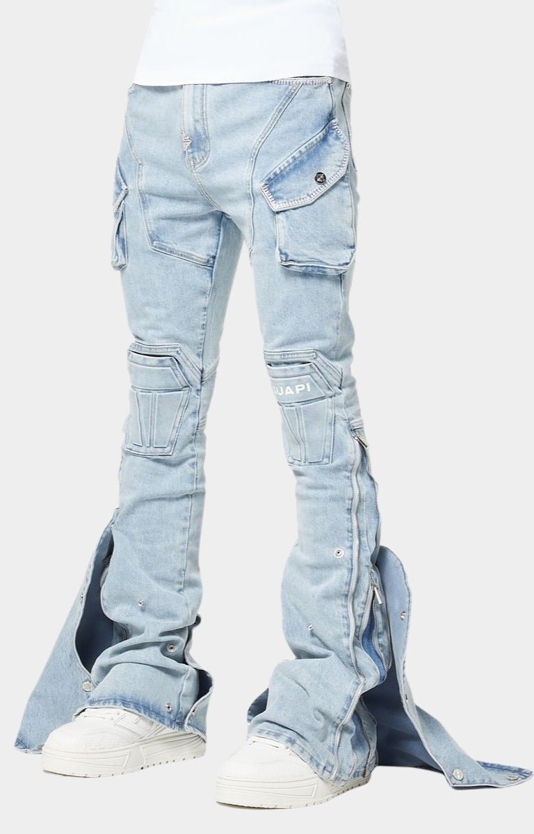 Extended flare panel with snap buttons on GUAPI jeans.
