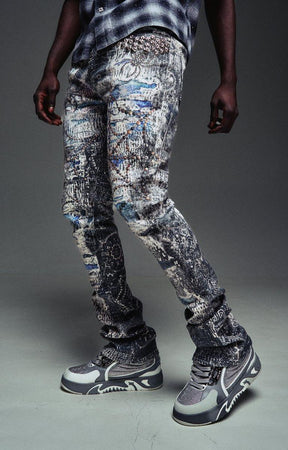 Guapi Hakai Spider graphic denim with distressed washed finish.