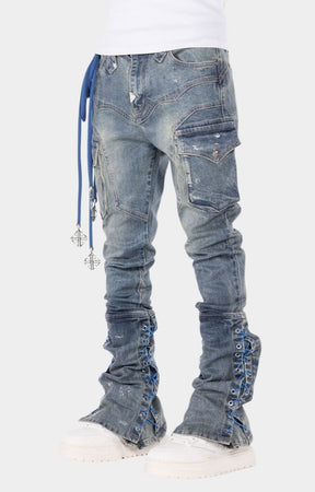 Stacked denim jeans featuring adjustable lace-up lower leg panels.