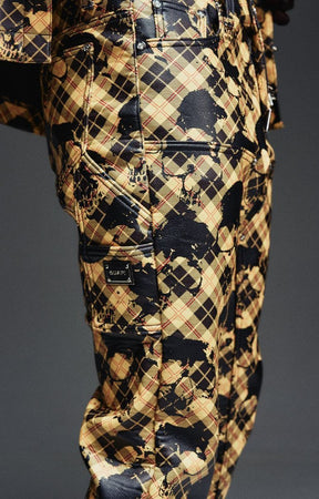 Guapi leather pants with branded hardware and decorative chain detail.