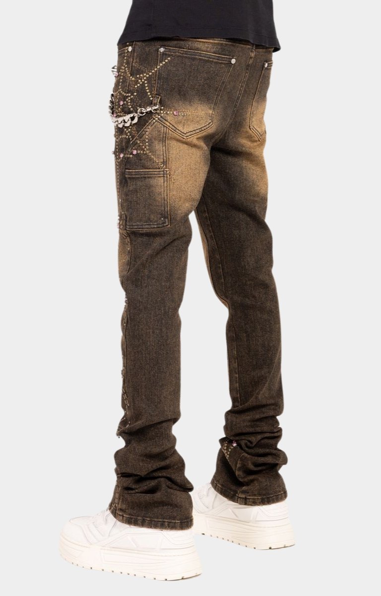 Bold web panel detail on lower leg of guapi brown spider jeans