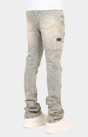 Luxury stacked denim jeans with crystal accents and premium construction.