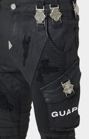 Engraved GUAPI metal buckle detail with Guapi printed on knee panel. 