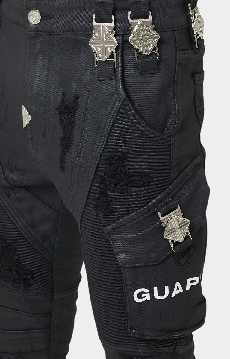 Engraved GUAPI metal buckle detail with Guapi printed on knee panel. 