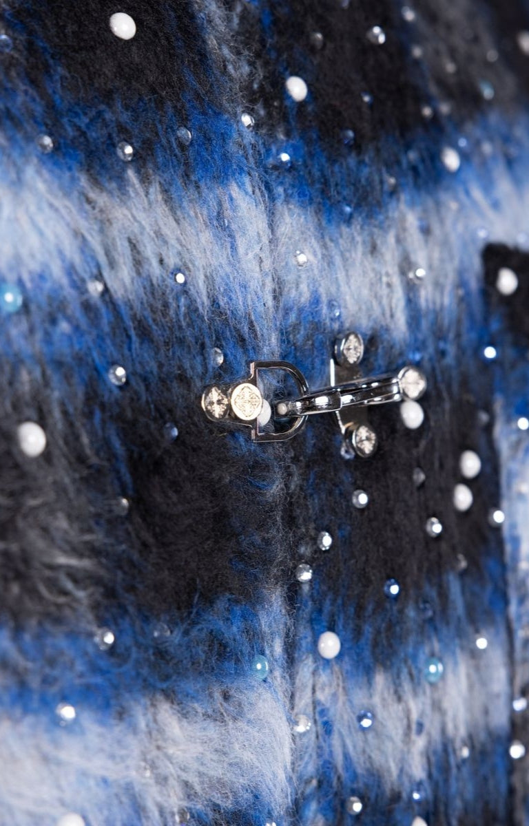Custom metal clasp closure detail on Guapi Midnight Sky Shirt.