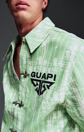 Guapi Mint Glock 17 Textured Leather Shirt featuring an all-over embossed graphic texture, metal toggle closures, structured collar, short sleeves, embroidered GUAPI logo, and relaxed streetwear fit.