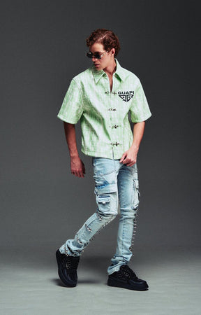 Guapi Mint Glock 17 Textured Leather Shirt featuring an all-over embossed graphic texture, metal toggle closures, structured collar, short sleeves, embroidered GUAPI logo, and relaxed streetwear fit.