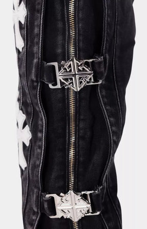 Full-length zipper detail on Guapi Obsidian Black Cross Buckle Denim.