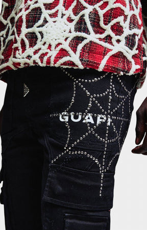 Guapi Obsidian Black designer cargo denim with flared leg silhouette.