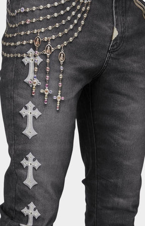 Texture closeup highlighting premium stretch black denim with 3D printed details