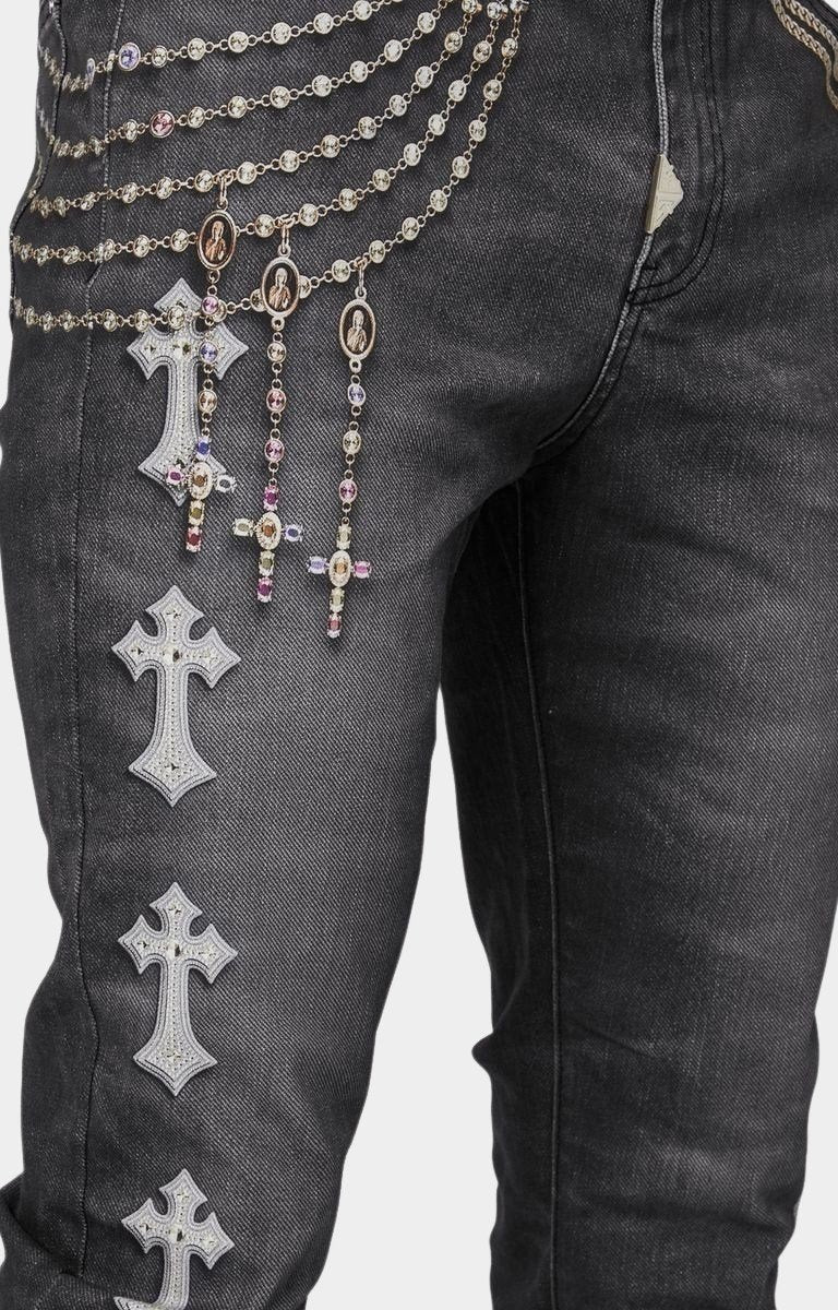 Texture closeup highlighting premium stretch black denim with 3D printed details