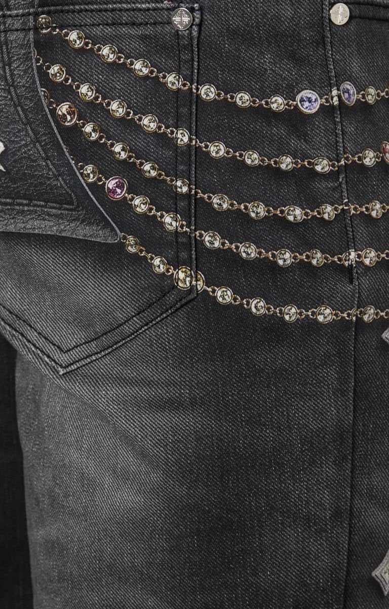 Macro shot showing faux embellishment illusion in black Heavens Vault jeans