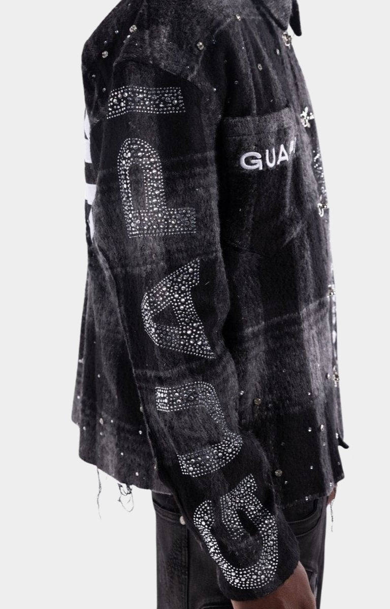 Long sleeve plaid construction on Guapi SNC overshirt.