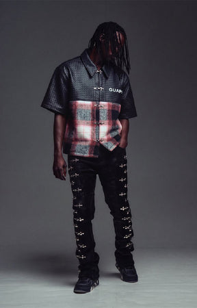 Guapi Obsidian Plaid Aviation Shirt featuring a black textured upper, black and red plaid body, metallic toggle-style closures, pointed collar and short sleeves.