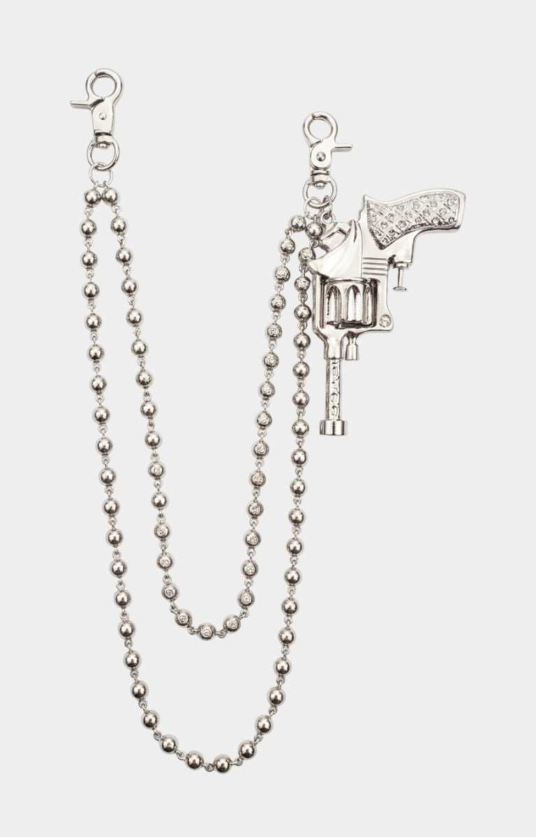 Guapi Pistol silver jeans chain featuring revolver-inspired pendant.