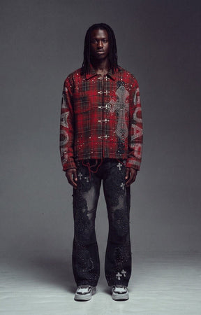 Guapi Blood Red Plaid Shirt. A red and black plaid button-up shirt heavily embellished with silver crosses, paired with dark distressed jeans and white sneakers.
