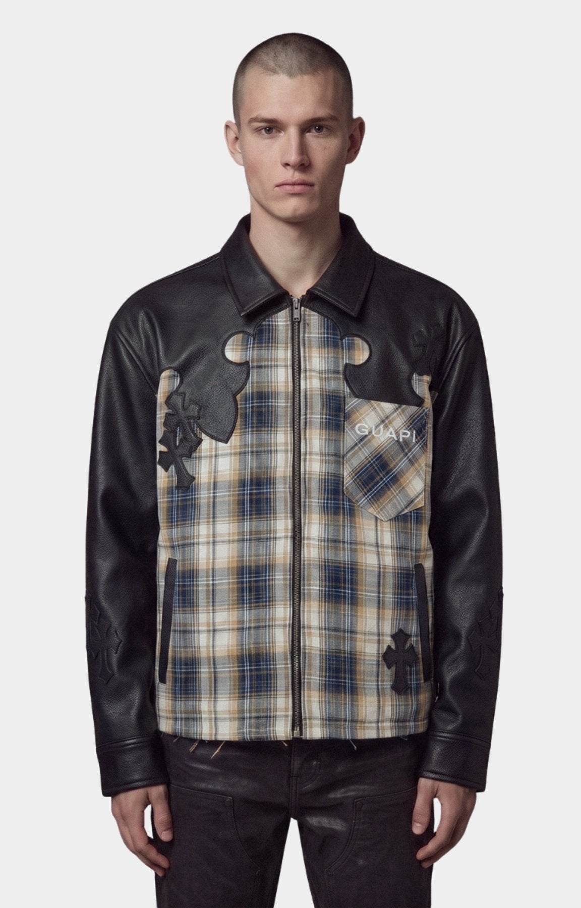 Guapi Plaid Cross Patch Flannel with black leather sleeves and collar, and a beige, blue, and brown plaid body panel. 
