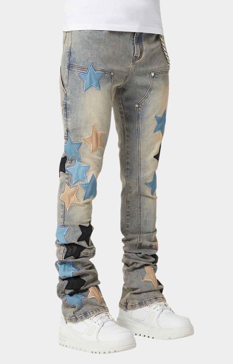 Leather star patch detail on GUAPI Powder Blue Vintage Stars Denim.