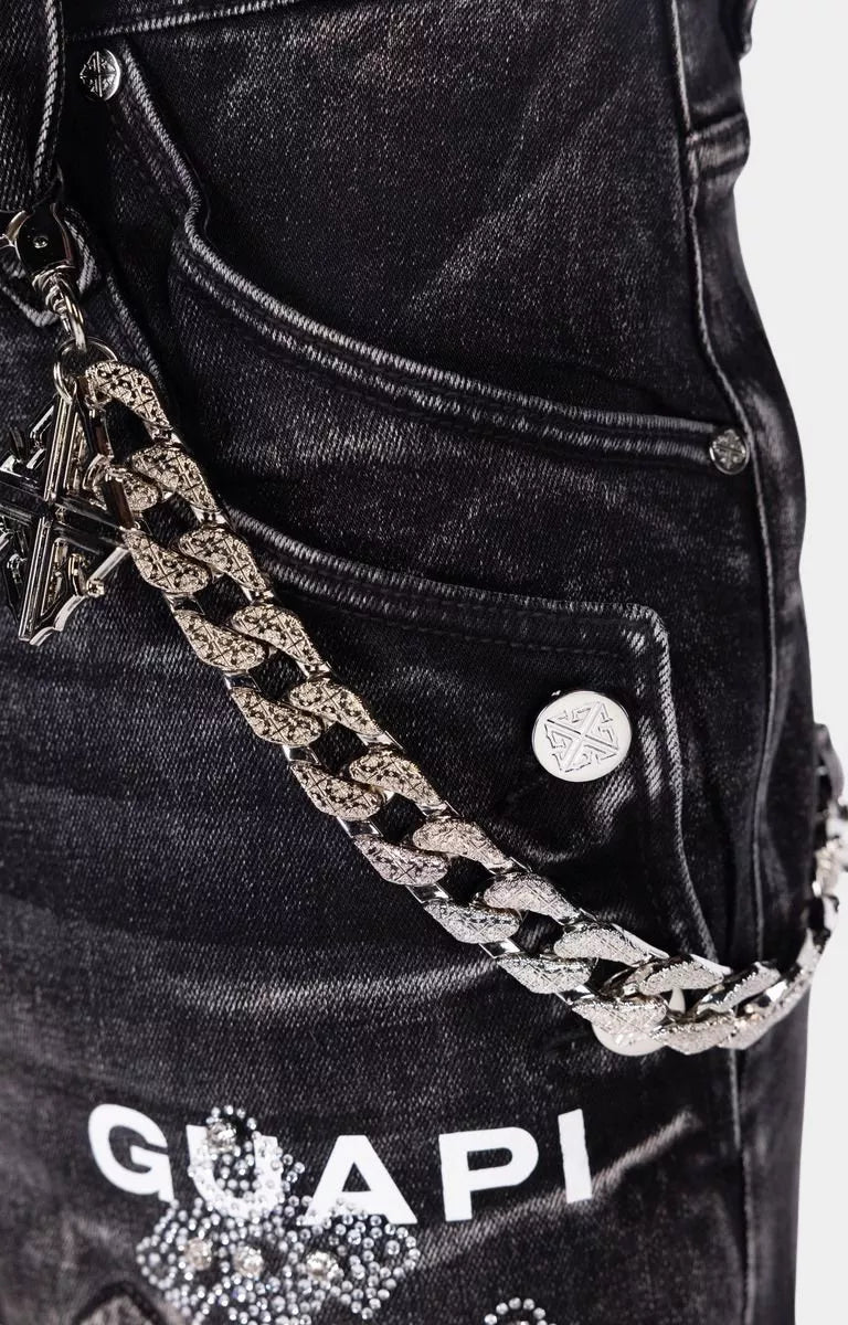 Premium black denim shorts designed for luxury streetwear styling with guapi emblem chain. 