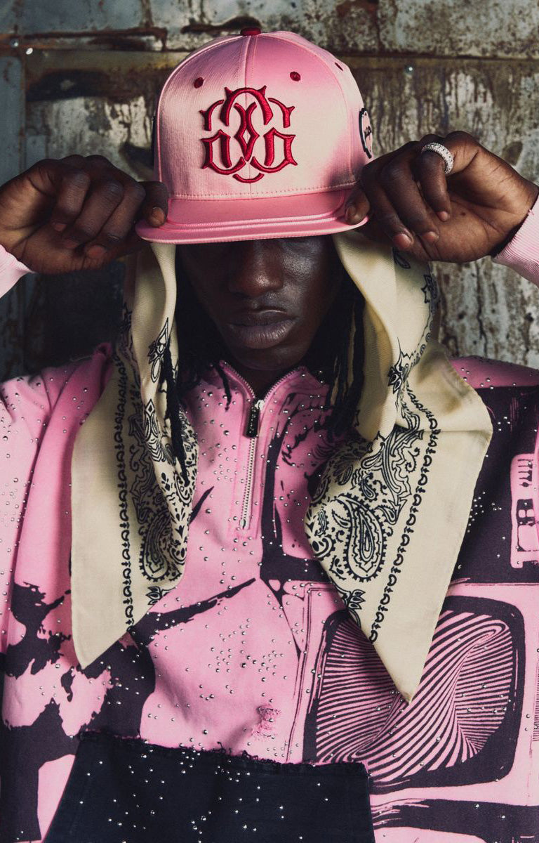GUAPI Punk Rivets Hoodie in pink and black with all-over rivet embellishments, contrasting black hood and panels, bold punk-inspired graphic artwork, ribbed cuffs and hem. A statement piece for alternative and graphic streetwear styling.