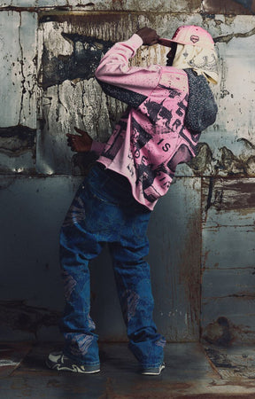 GUAPI Punk Rivets Hoodie in pink and black with all-over rivet embellishments, contrasting black hood and panels, bold punk-inspired graphic artwork, ribbed cuffs and hem. A statement piece for alternative and graphic streetwear styling.