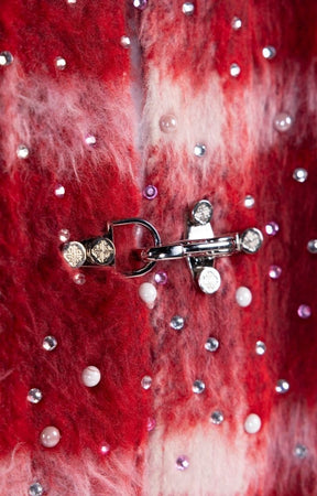 Custom metal clasp closure detail on Guapi Red Inferno Shirt.