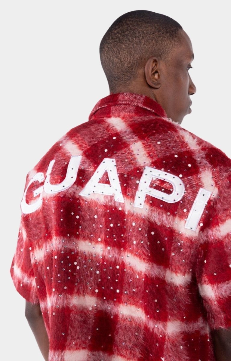 Embroidered GUAPI logo detail on Red Inferno Shirt.