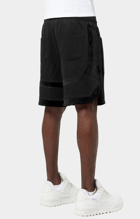 Black rhinestone streetwear shorts with futuristic cyborg-inspired graphics.