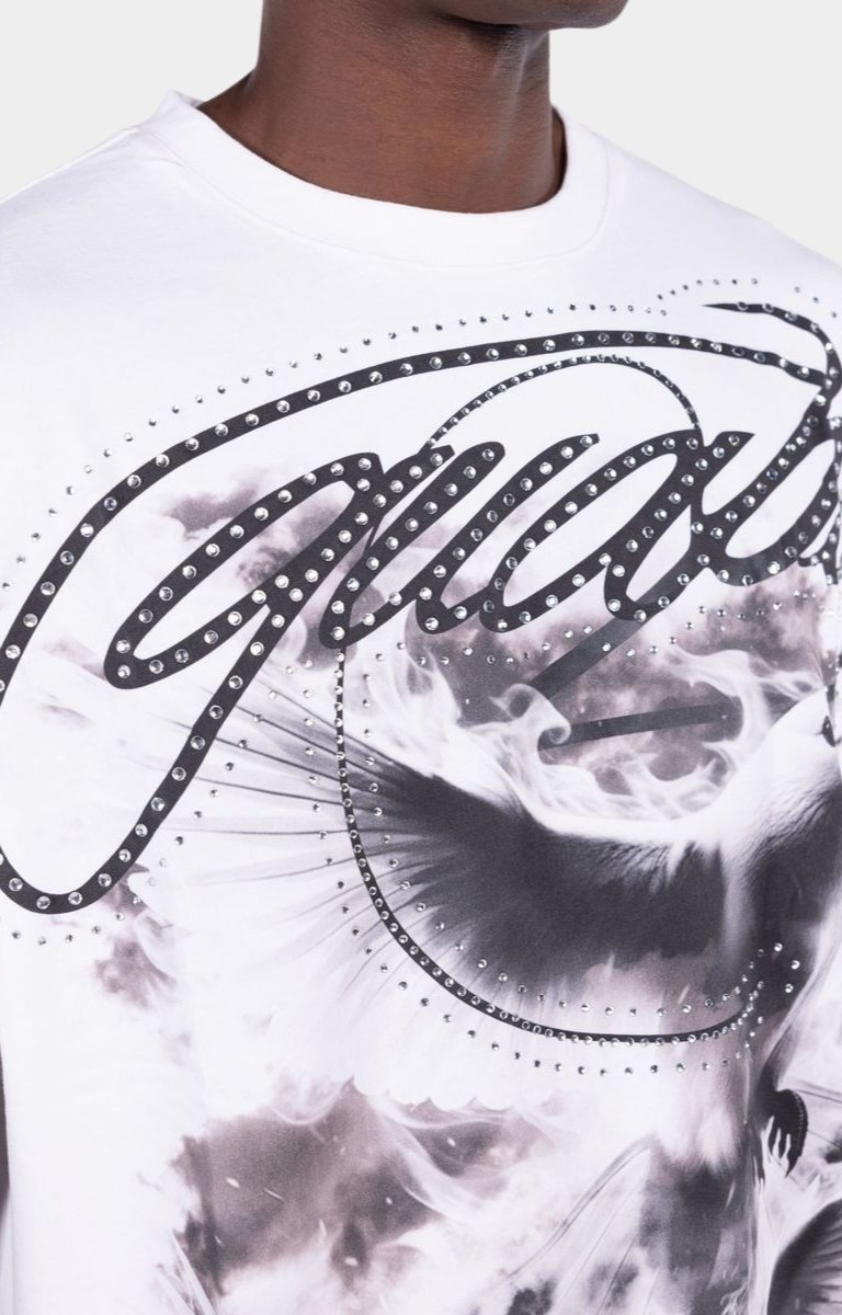 Luxury streetwear t-shirt with rhinestone embellishments and bold graphic print.